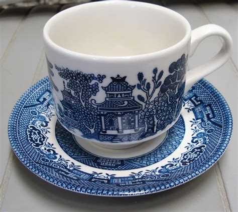 Blue willow cups and saucers - The folks at Blue Willow call this the "Charm of the Ware." Vintage Blue Willow pattern. Teacup saucer: 5-1/2" diameter. Dishwasher and microwave safe. 100% ironstone. Made in England. Coordinating Blue Willow Large Serving Bowl (#87911), Sugar and Creamer Set (#87912), Teacup (#87913), and Gravy Boat (#87915), sold separately. Product Details.